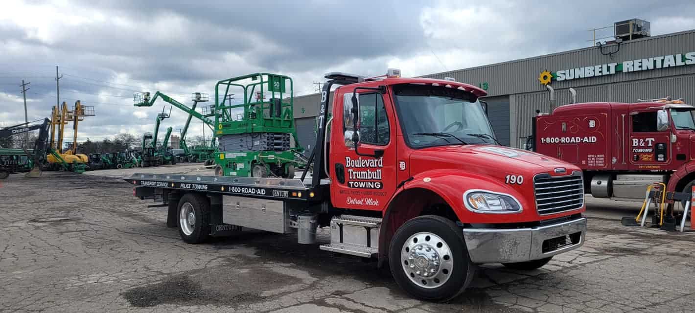 flatbed truck with scissor lift.